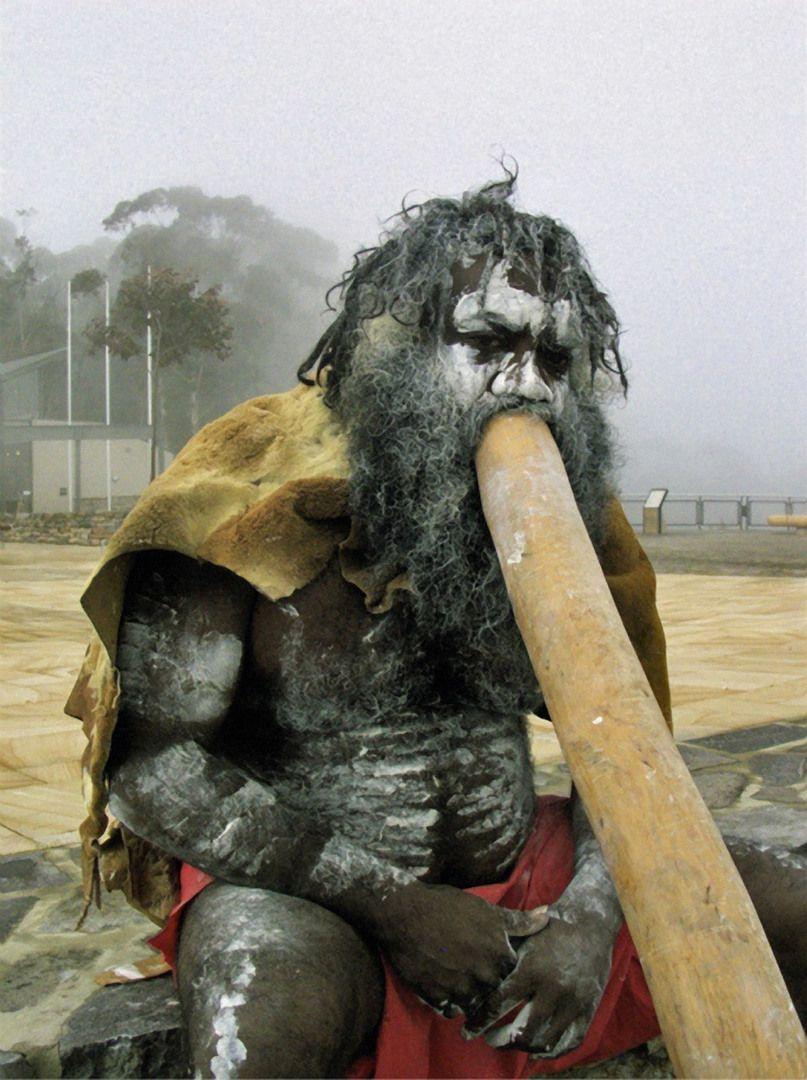 See an Australian Aborigine playing the Didgeridoo