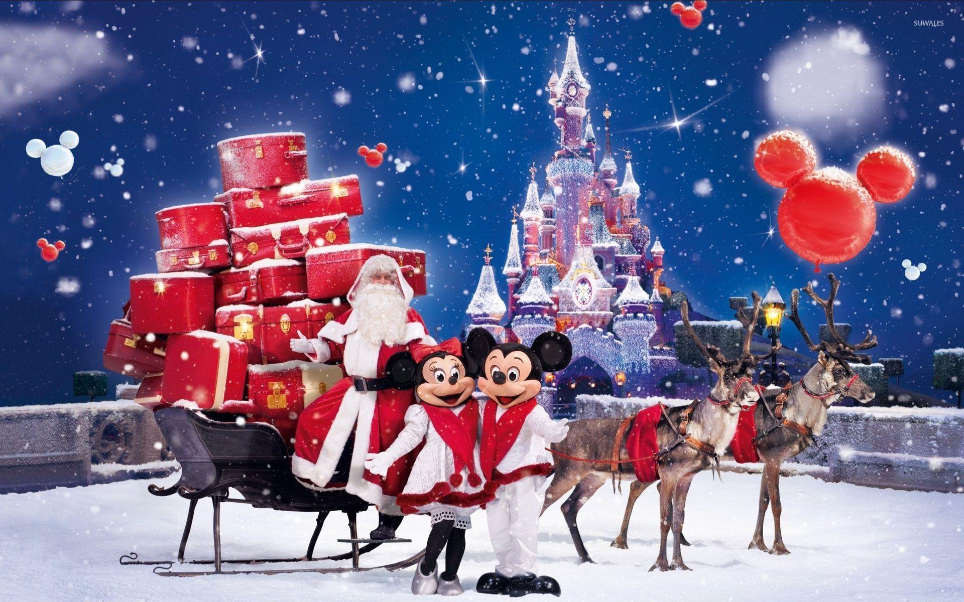 Santa Claus bringing gifts in a Disneyland park wallpapers