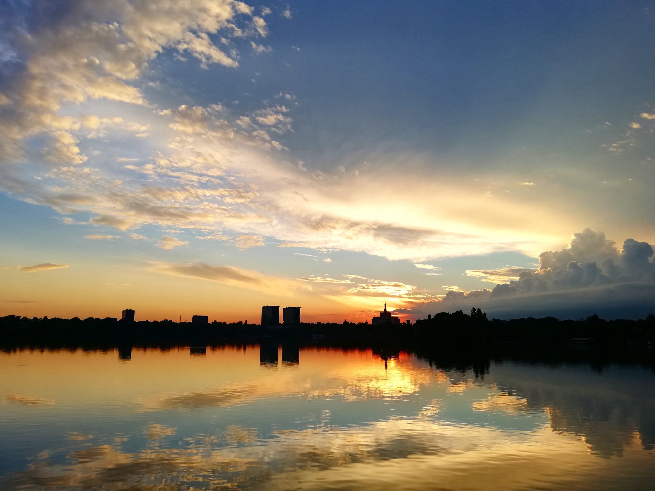 Sunset Over Lake Bucharest Romania 4K wallpapers