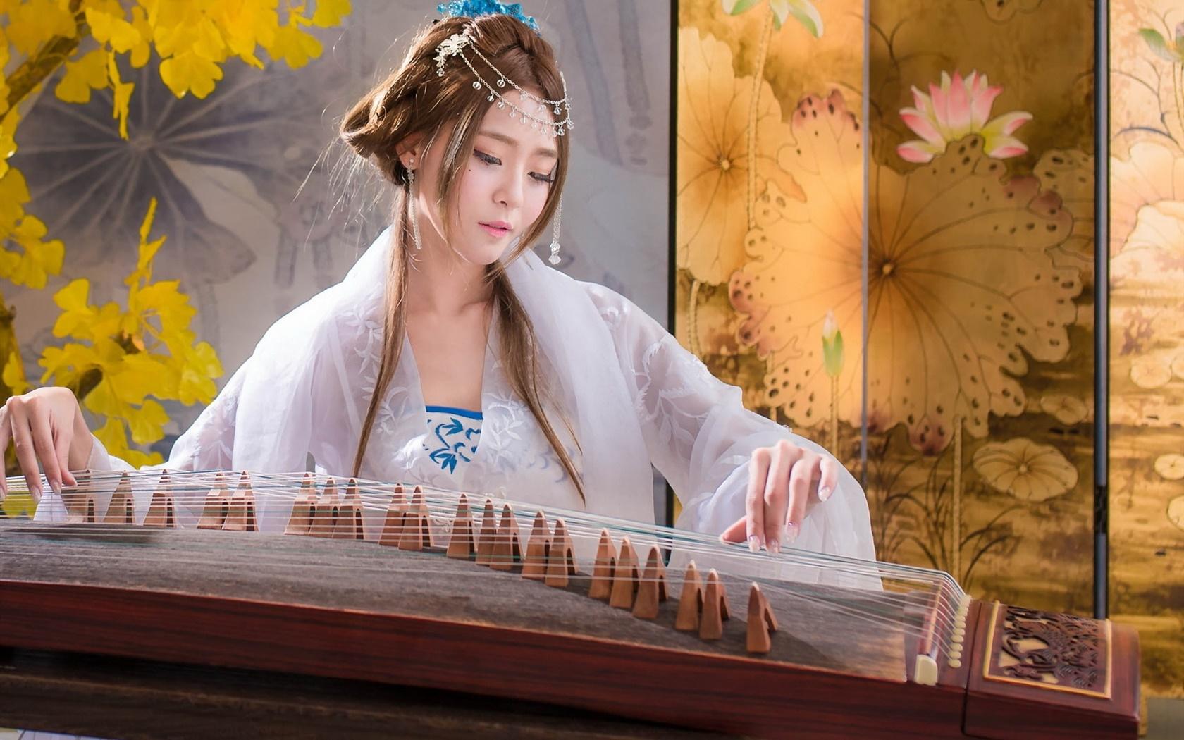 Chinese girl playing zither Desktop Wallpapers