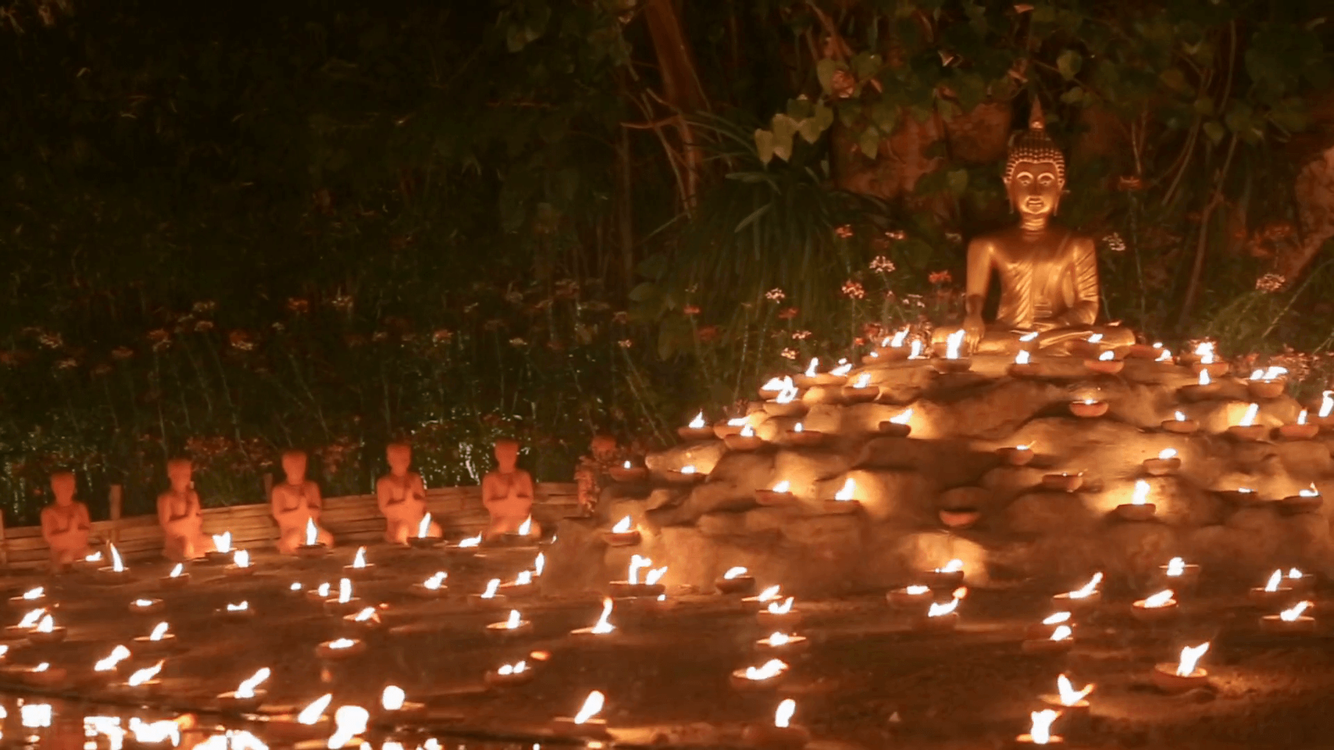 Magha puja day, Monks light the candle for buddha, Chiangmai