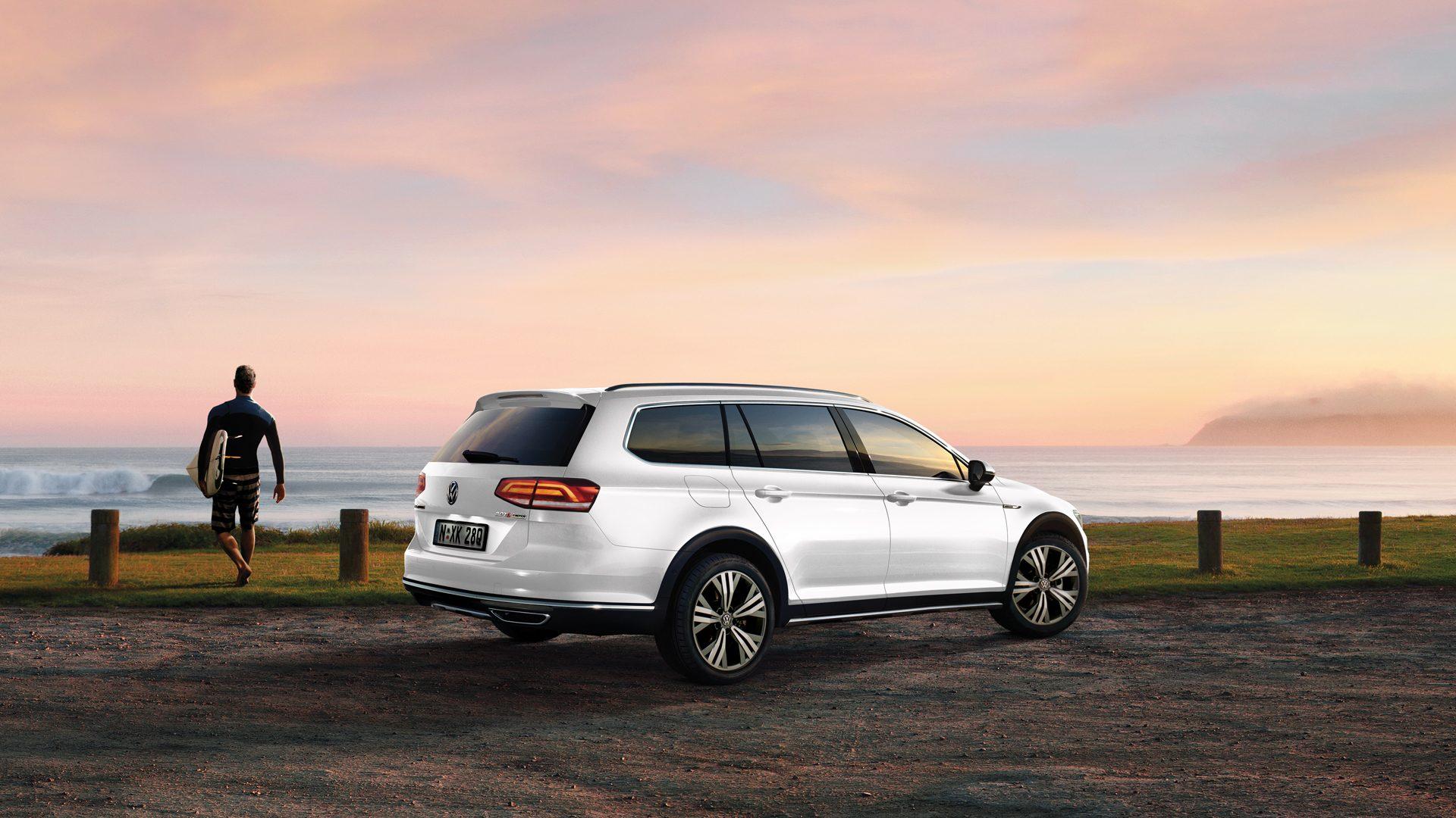 2019 Volkswagen Passat Alltrack white color side view near lake off