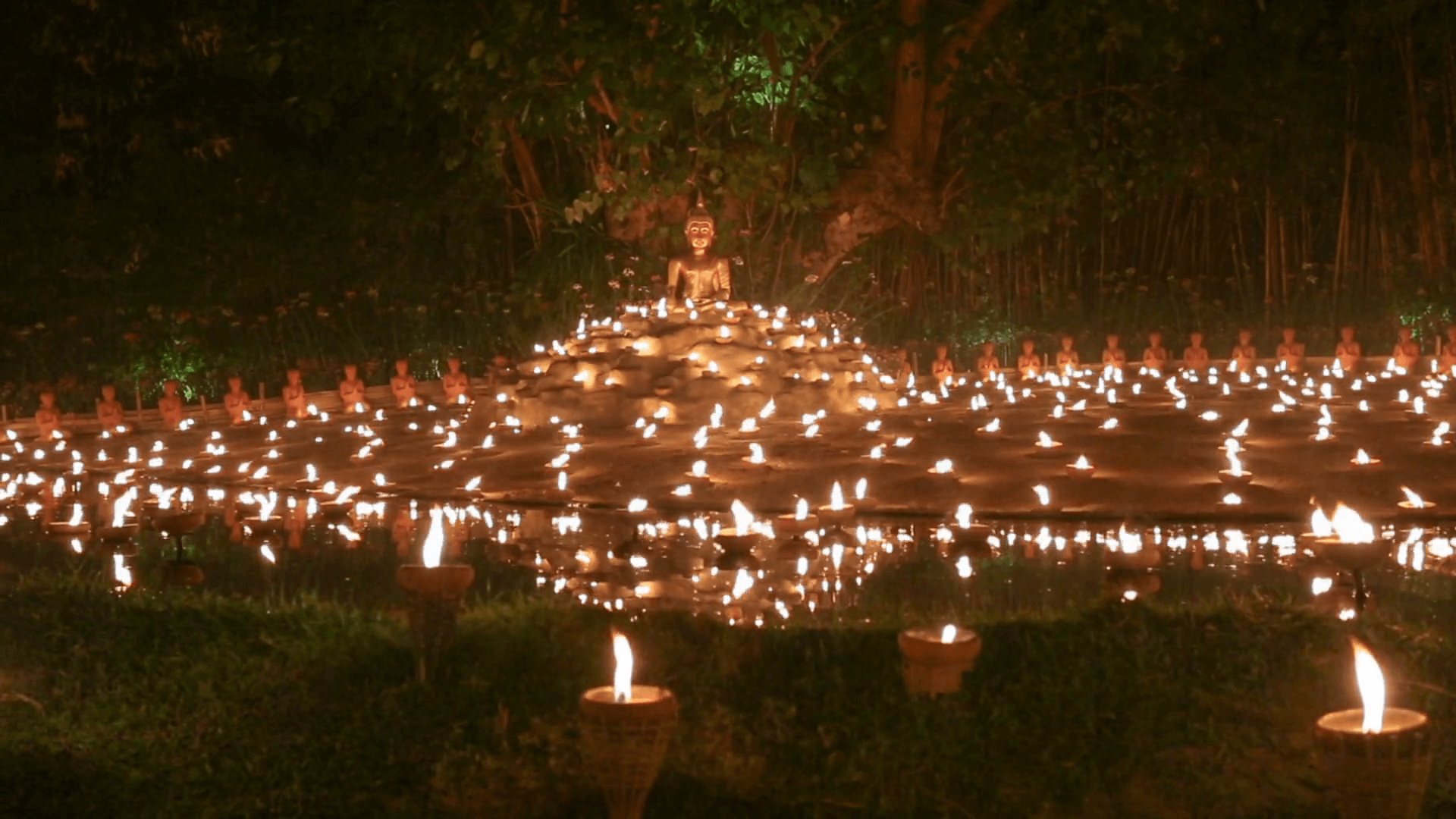 Magha puja day, Monks light the candle for buddha, Chiangmai