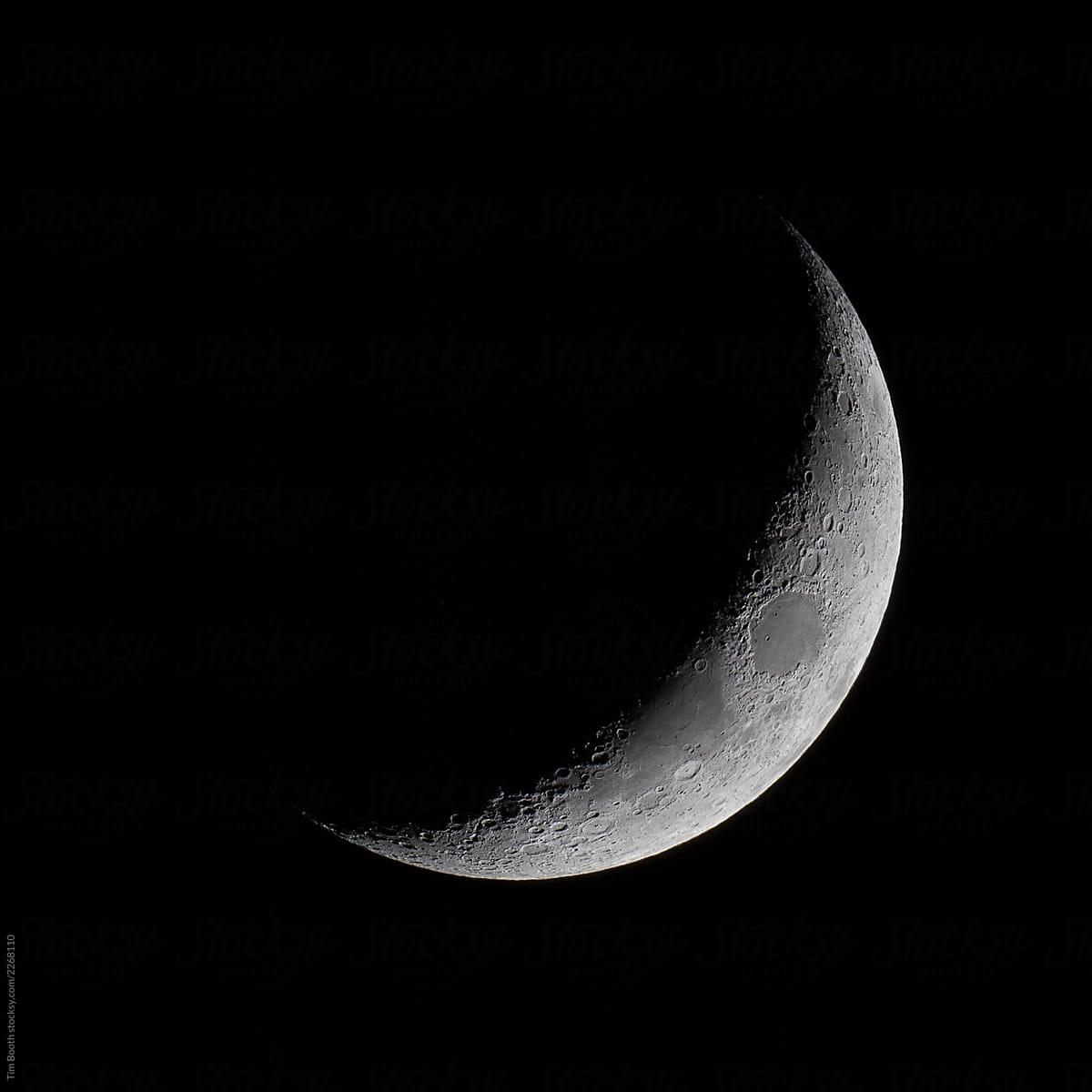 The Crescent Moon In The Night Sky.