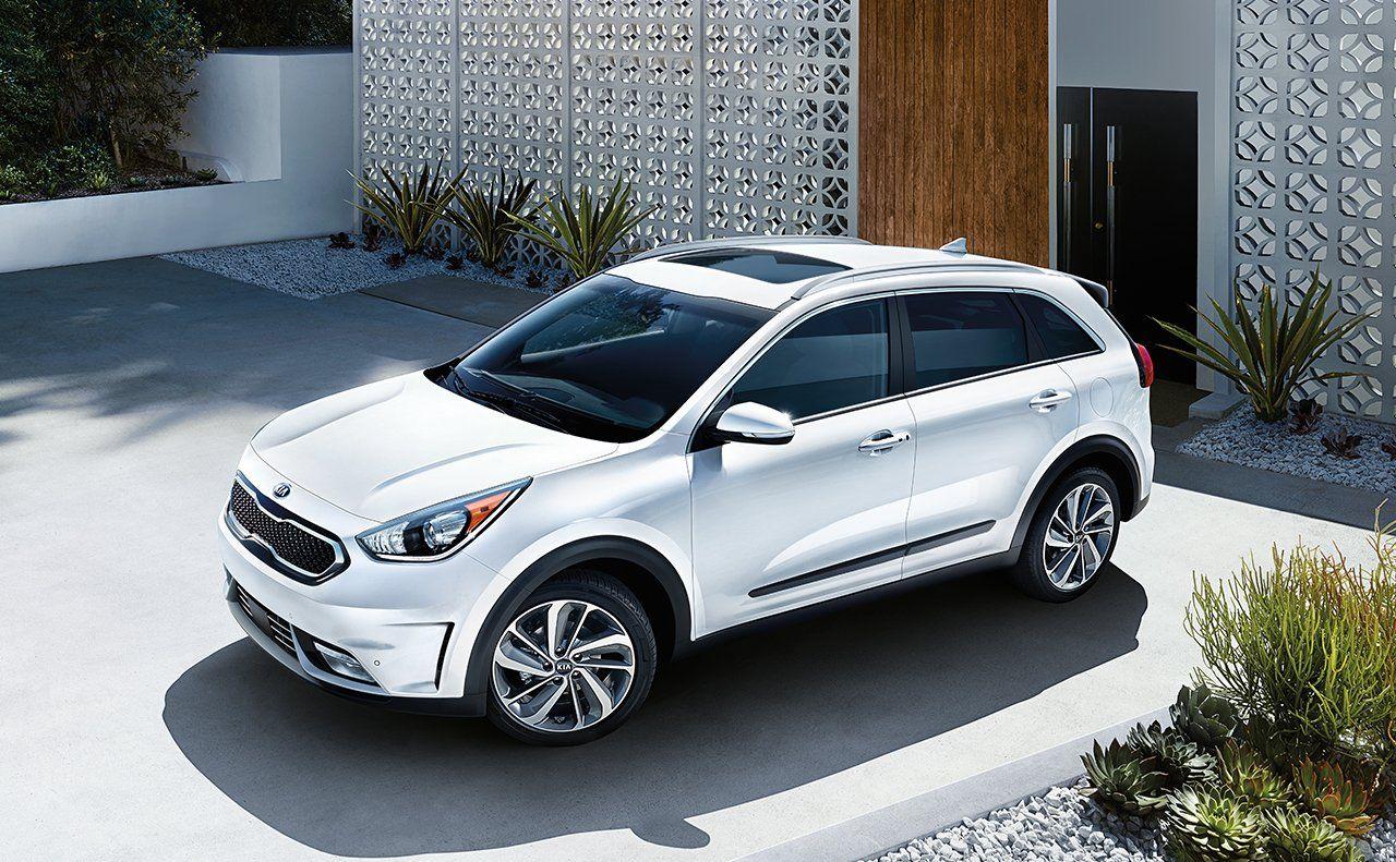 2019 Kia Niro EV hybrid white color park outside home wide 4k hd