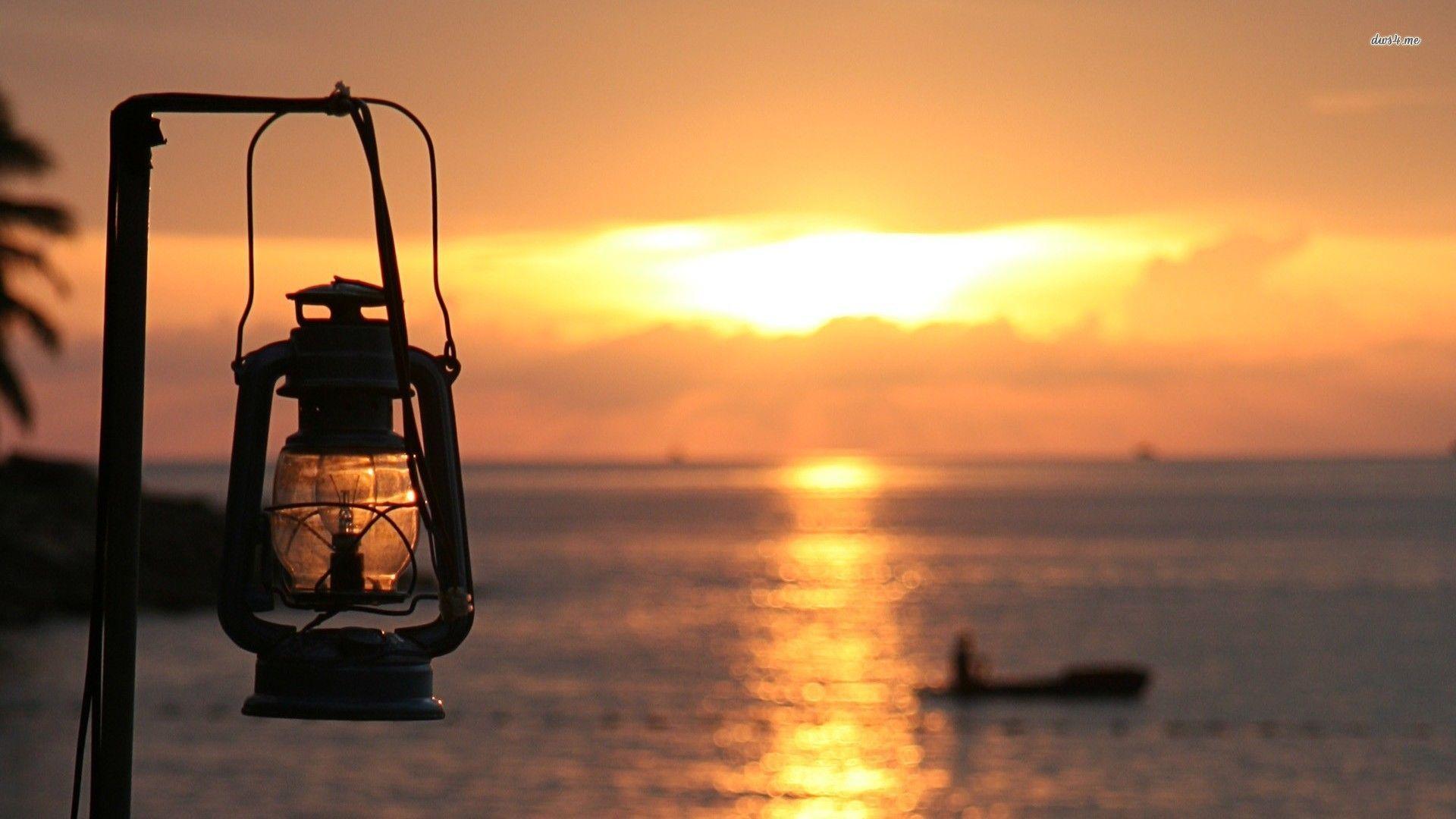 Oil lamp on Panaji beach, India wallpapers