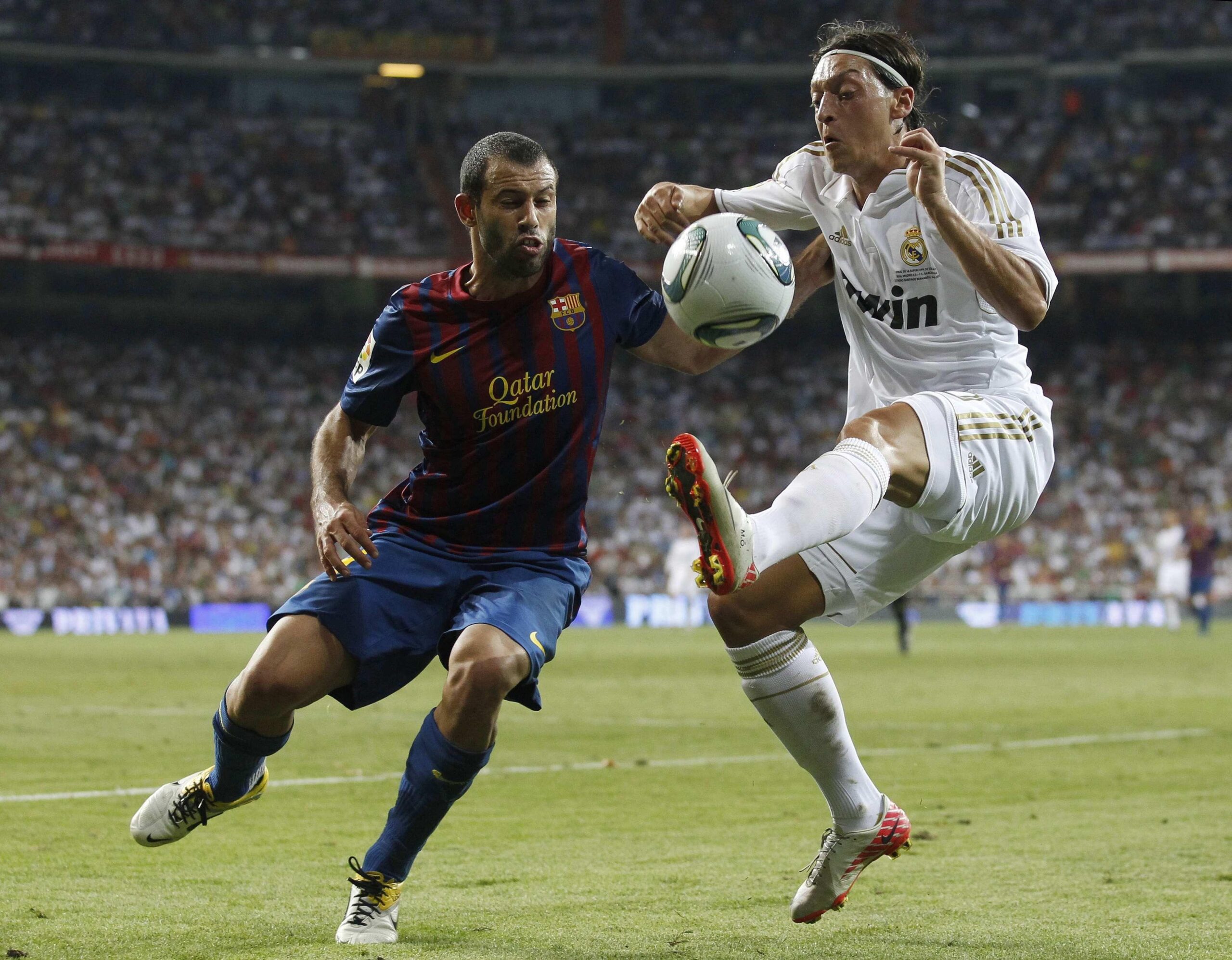 Mesut Ozil, Javier Mascherano, Real Madrid, FC Barcelona, Soccer