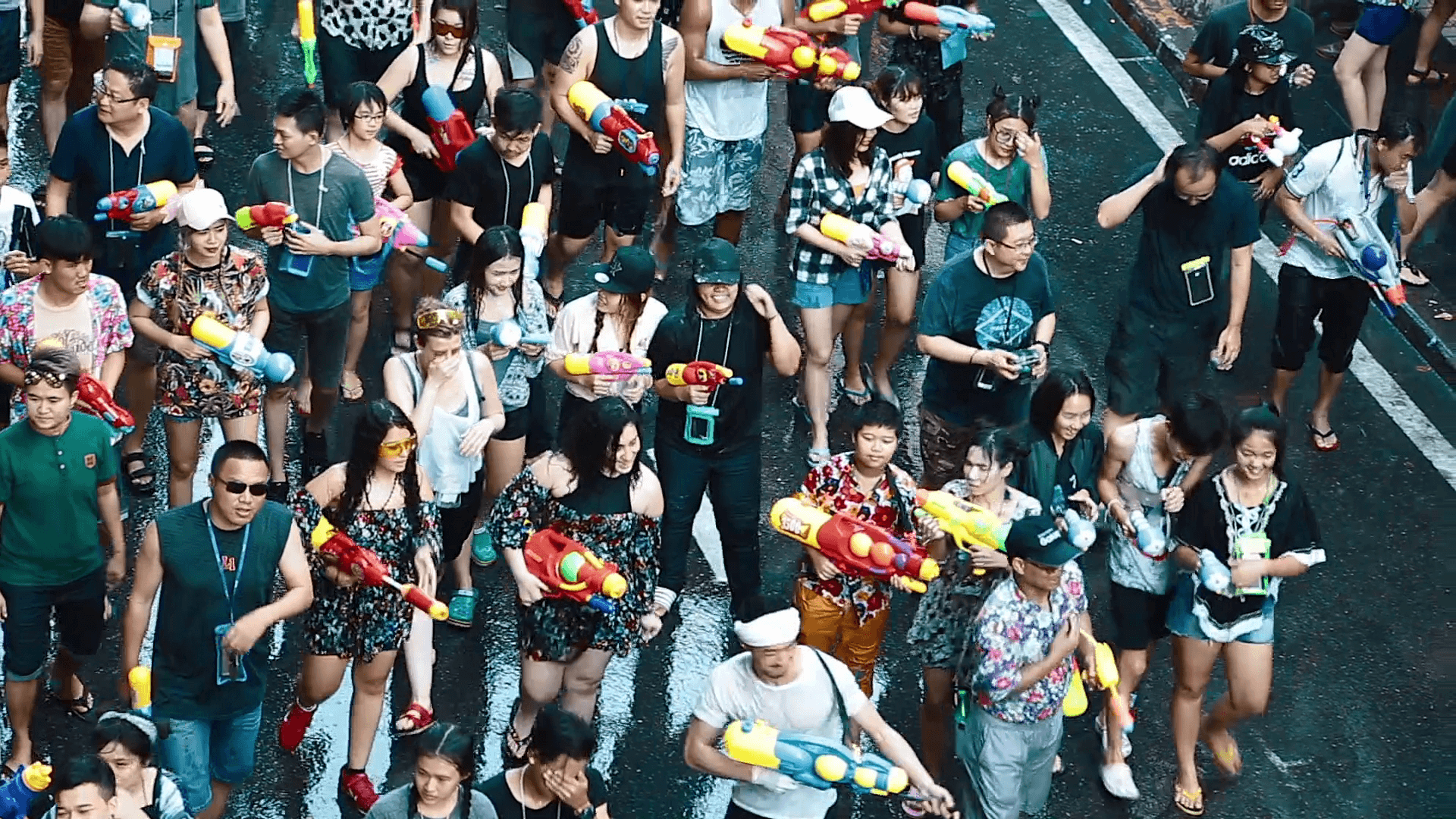 Tourist zoom in top view still pov shot of Bangkok Songkran festival