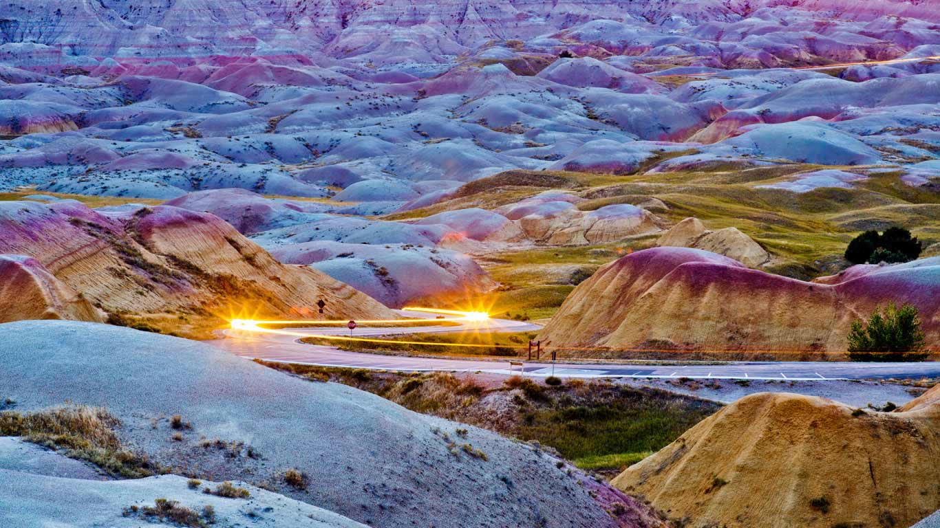 Headlights streaking through Badlands National Park, South Dakota