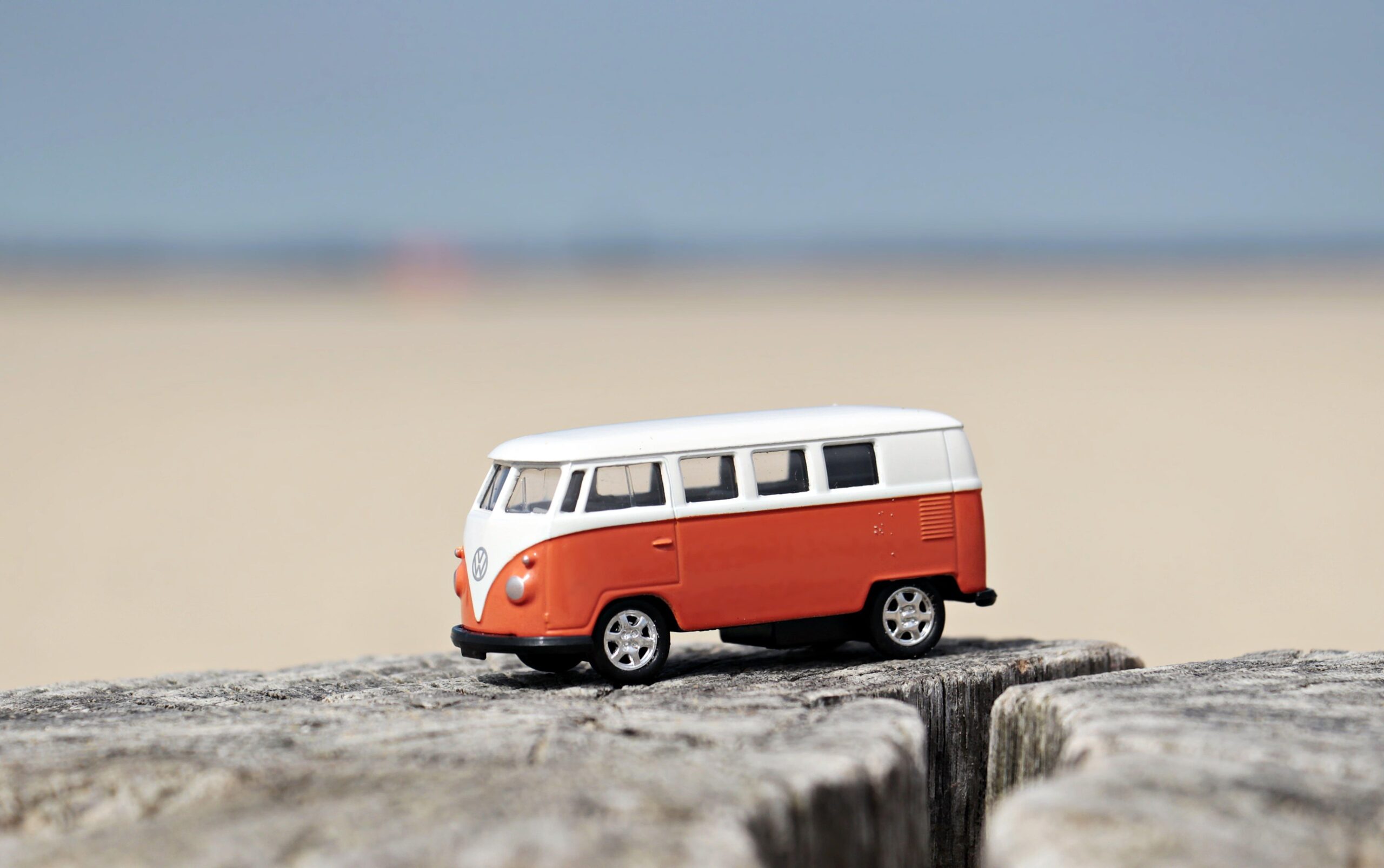 Selective focus photography of orange and white bus HD wallpapers