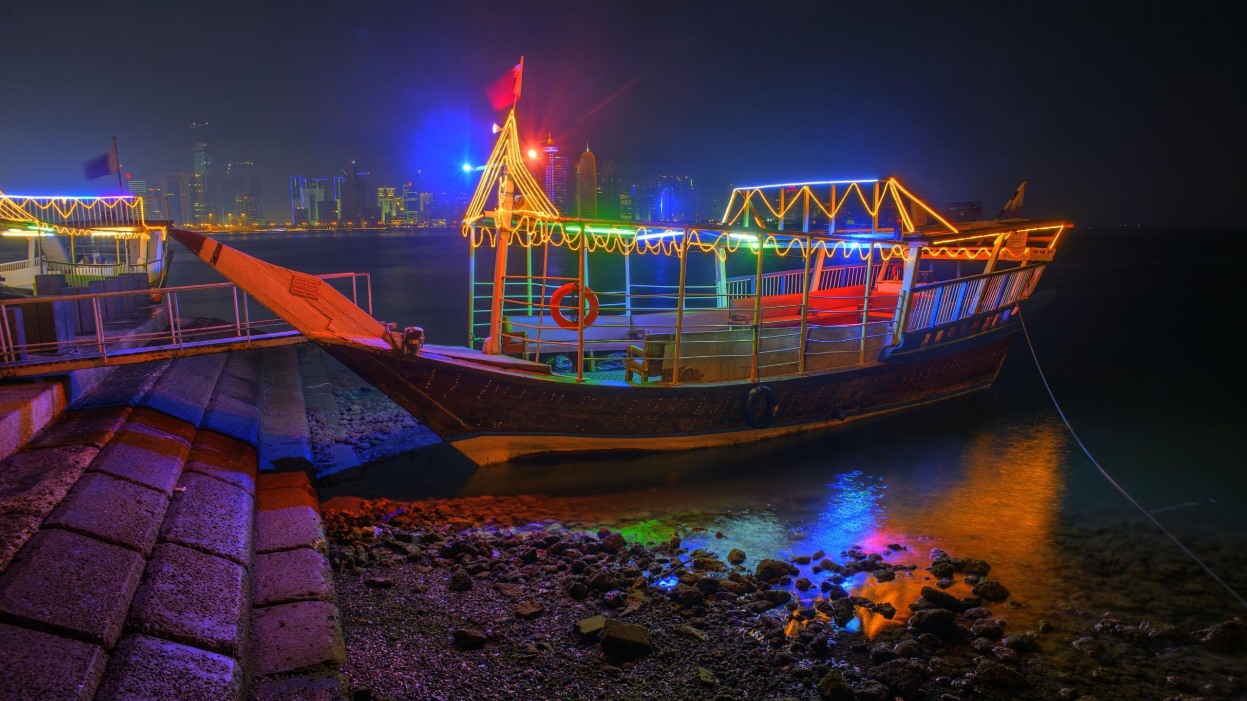 Colorful Illuminated Dhow Boat At Night