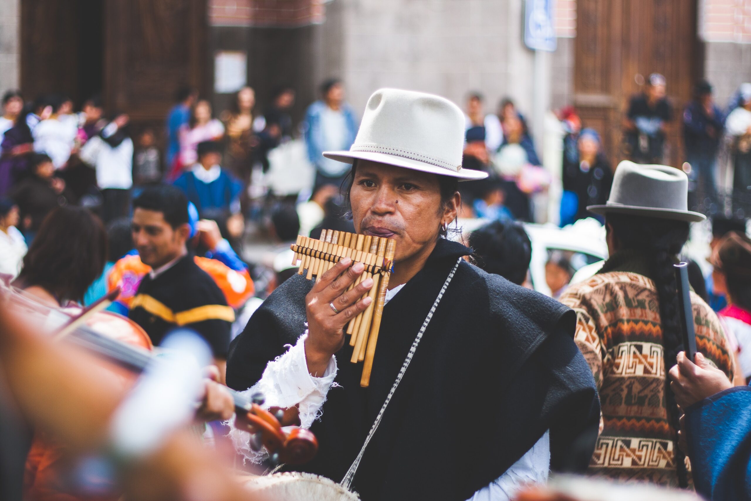 Man Playing Bamboo Wind Instrument · Free Stock Photo