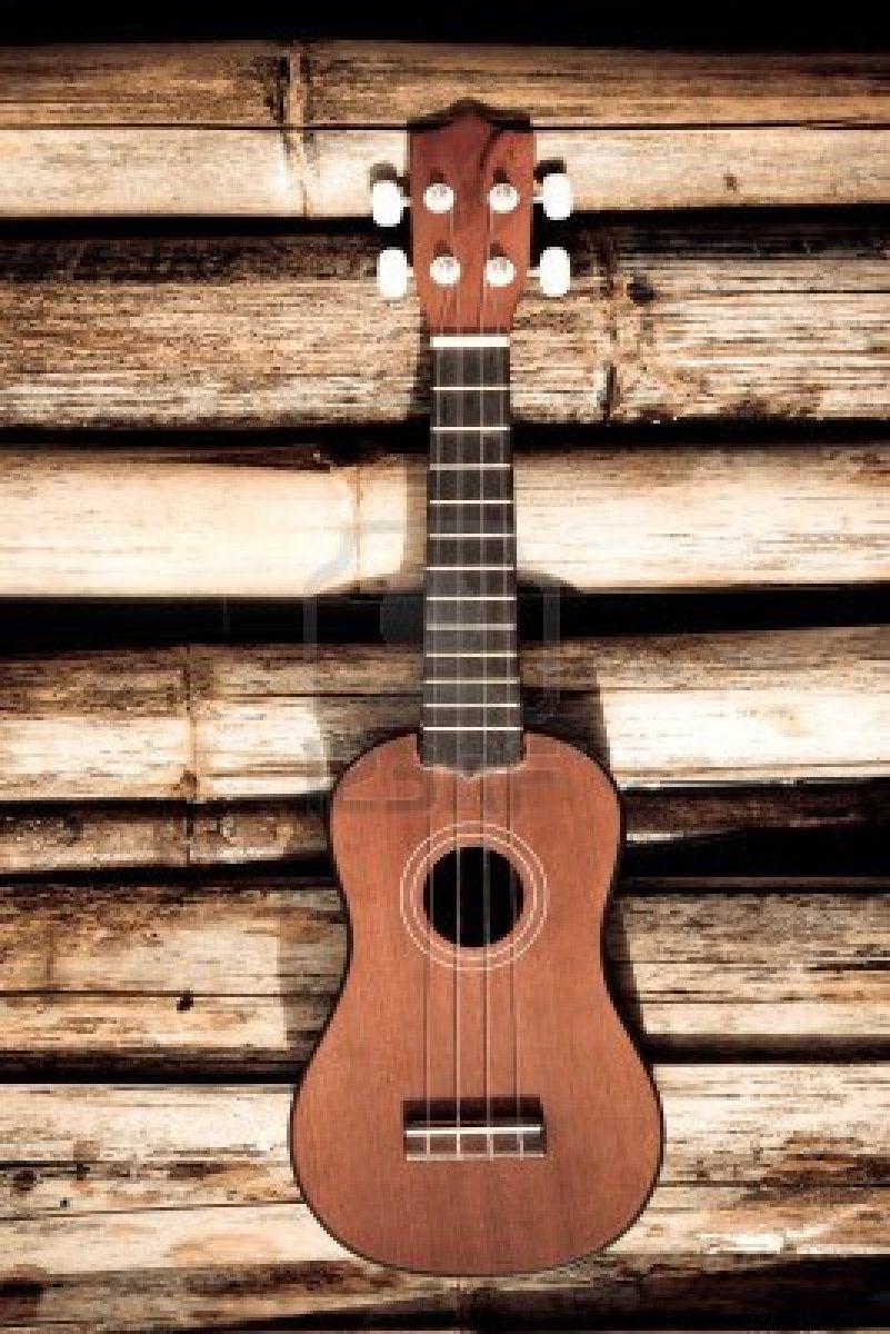 Ukulele on bamboo backgrounds Stock Photo