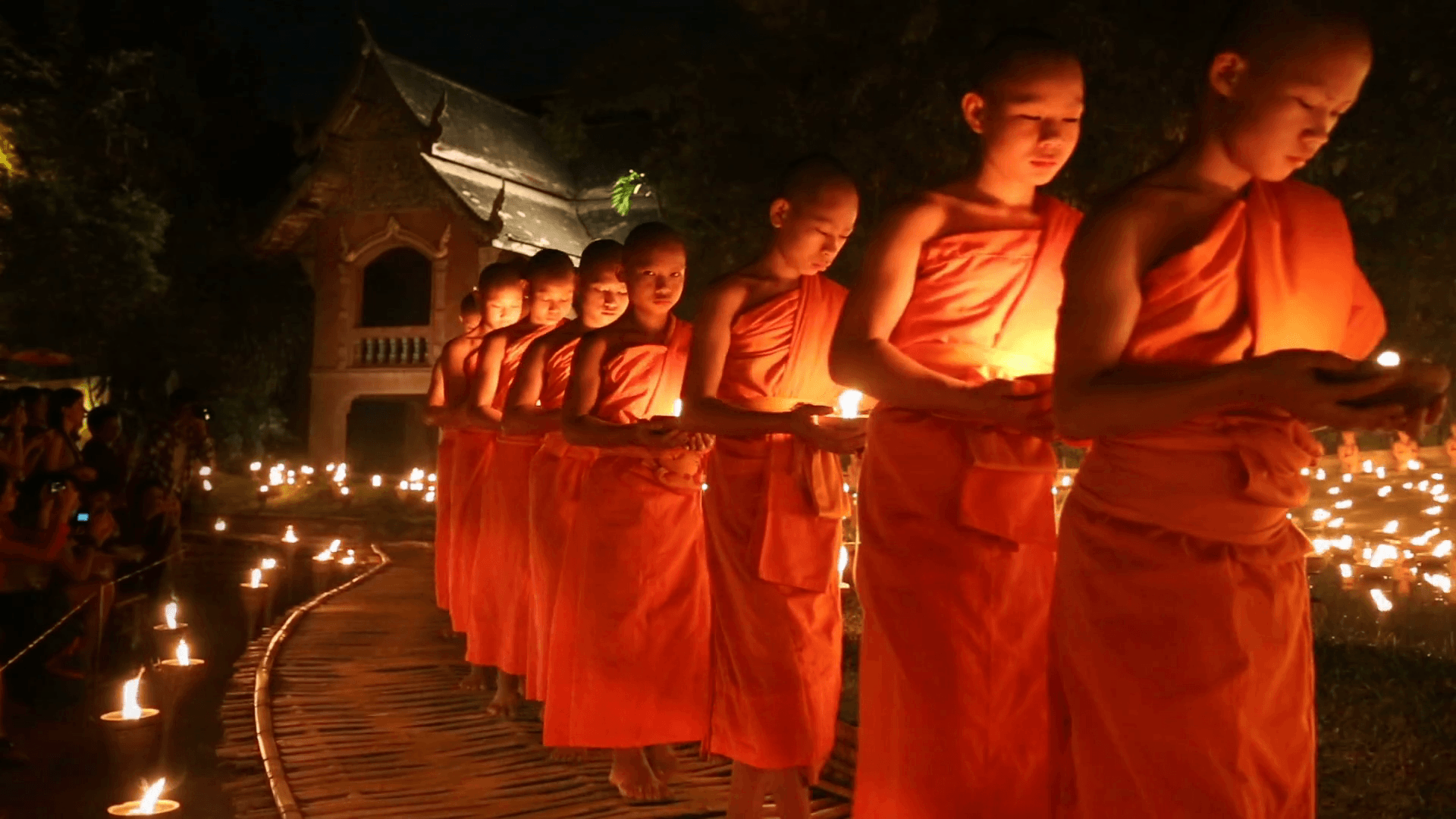 Magha puja day, Monks light the candle for buddha, Chiangmai