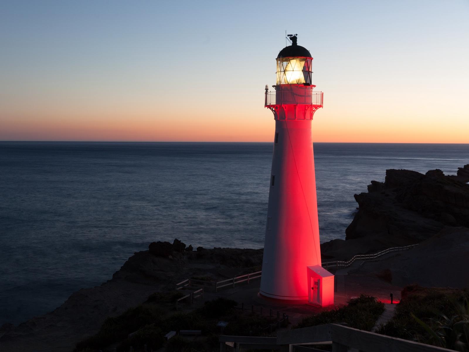 Download wallpapers lighthouse, sea, skyline, night