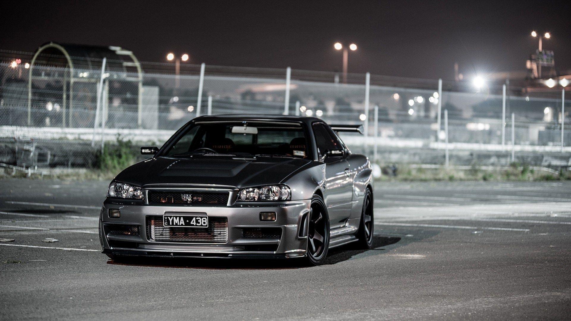 Black Nissan Skyline R34 Street Fence Night Lights HD Wallpapers