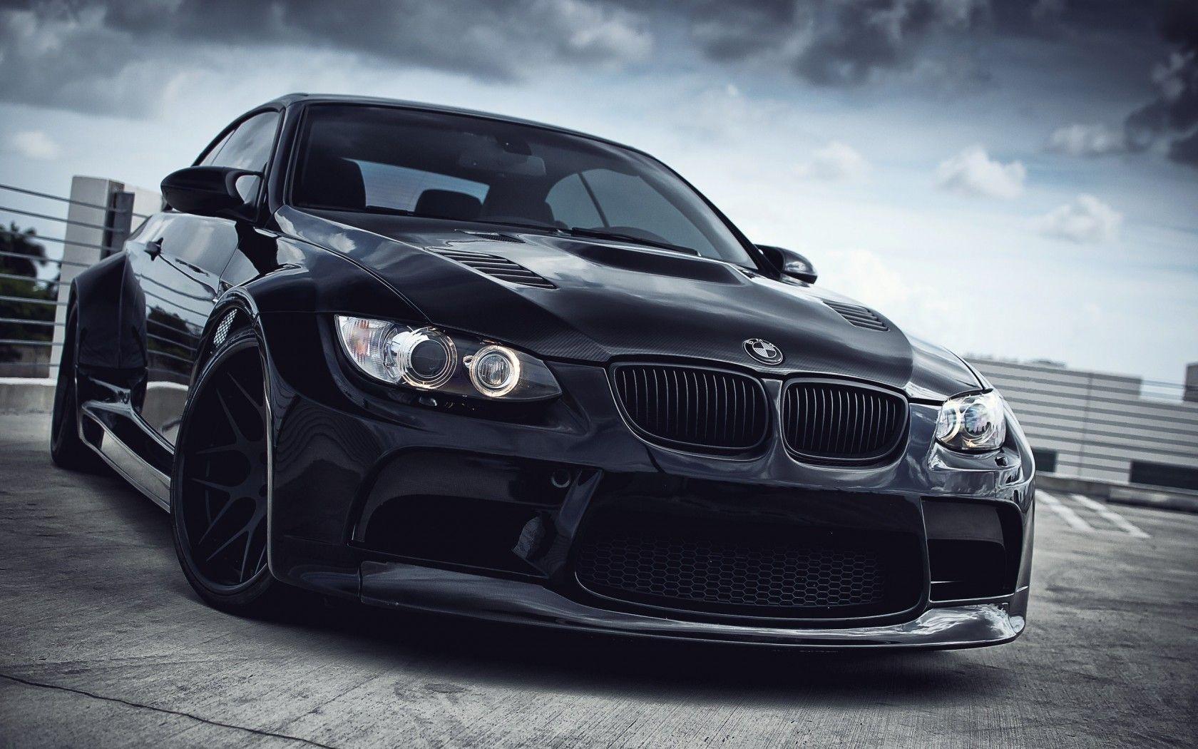 Black BMW M3 with a wide body kit Wallpapers in HD