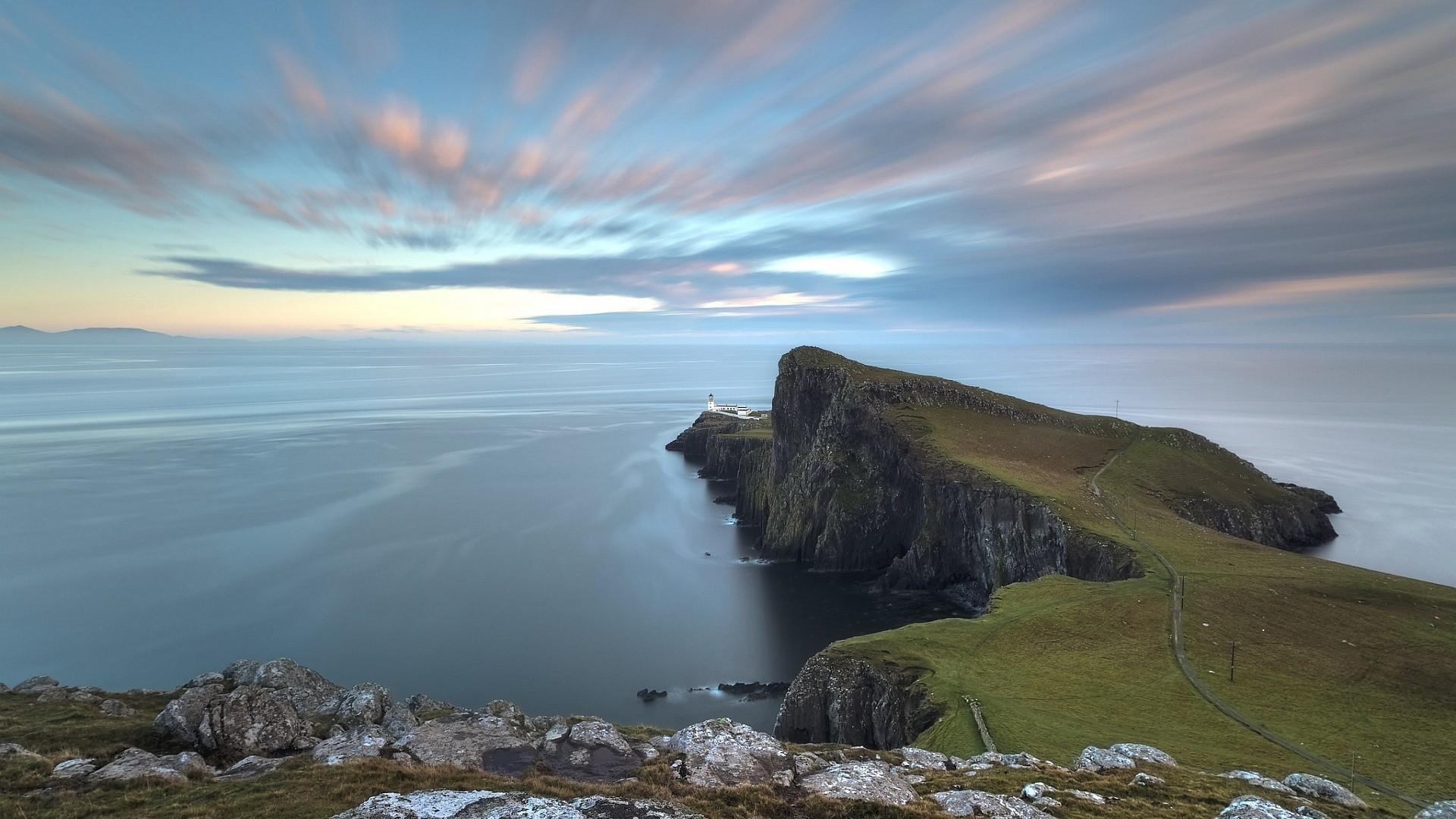 Lighthouse on coastal point in scotland wallpapers