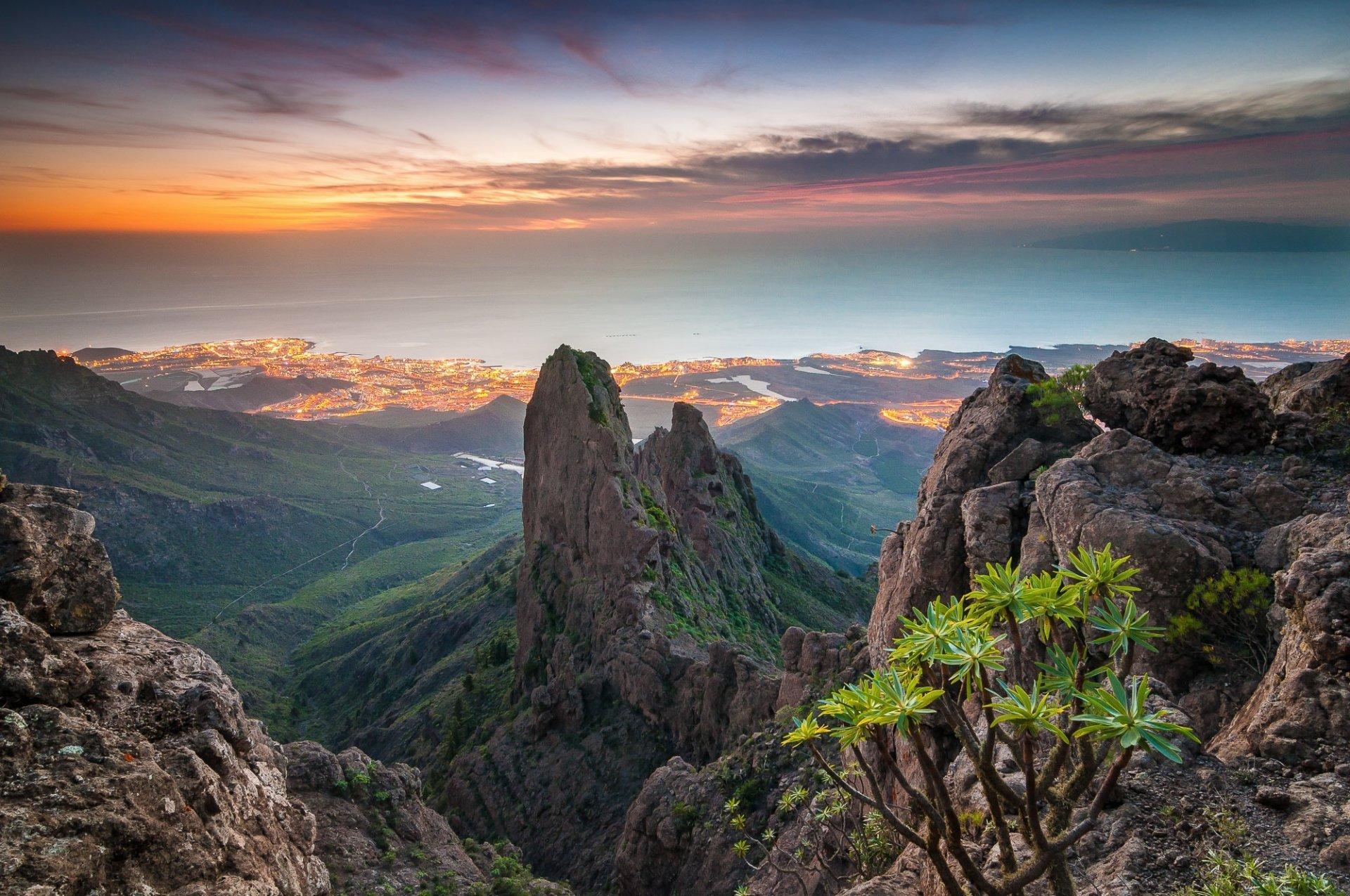 canary islands atlantic ocean sky clouds mountain rock town lights