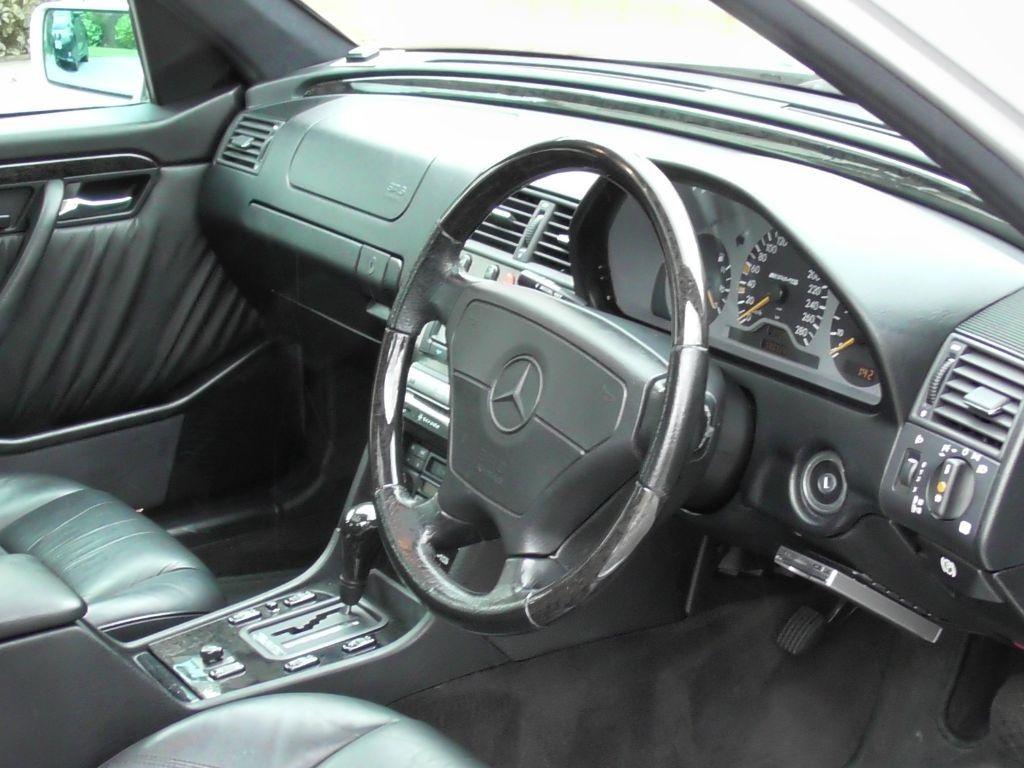 Used Brilliant Silver Met with Black Leather Mercedes C36 AMG For