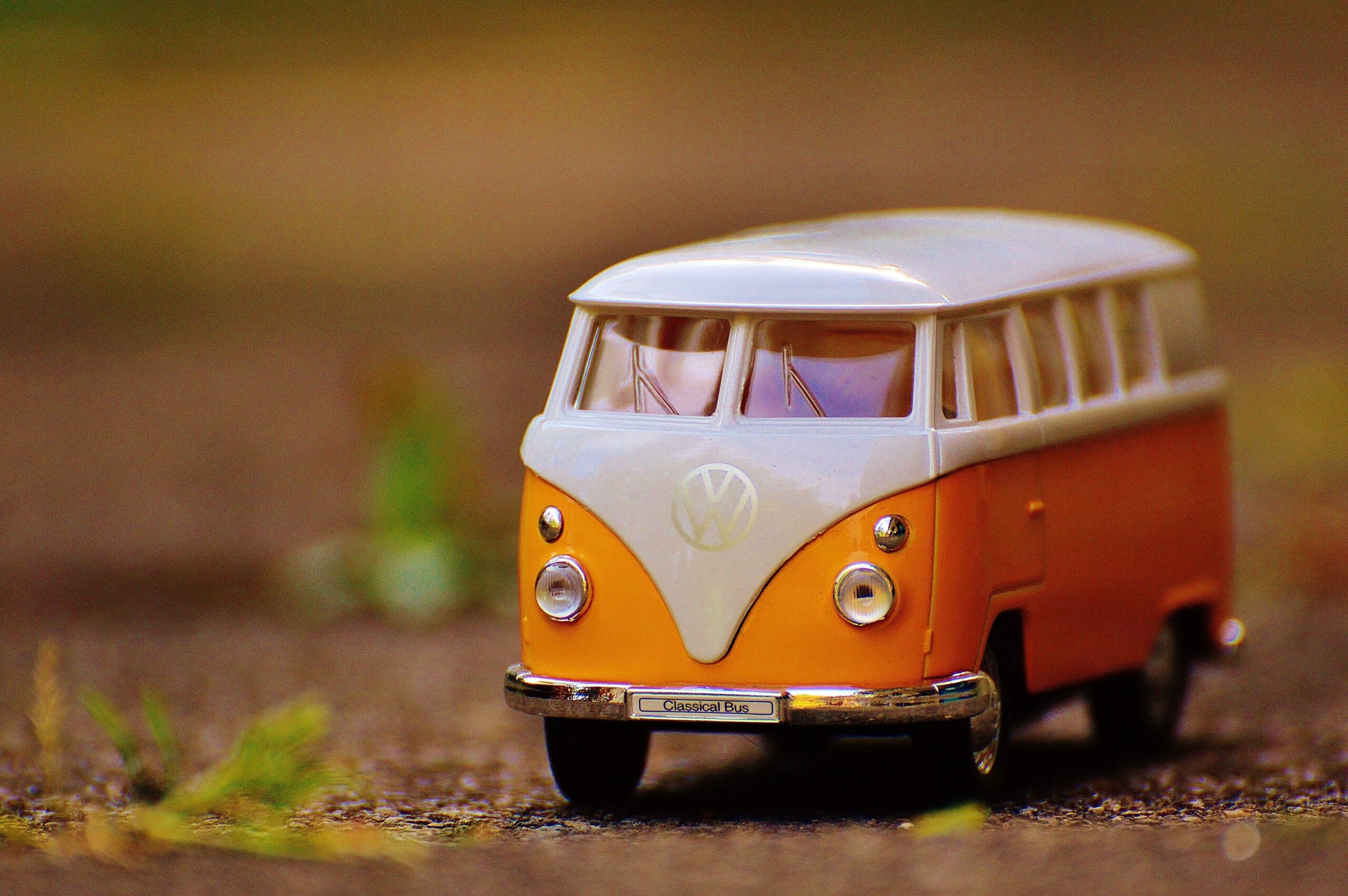 Orange and white Volkswagen bus toy HD wallpapers