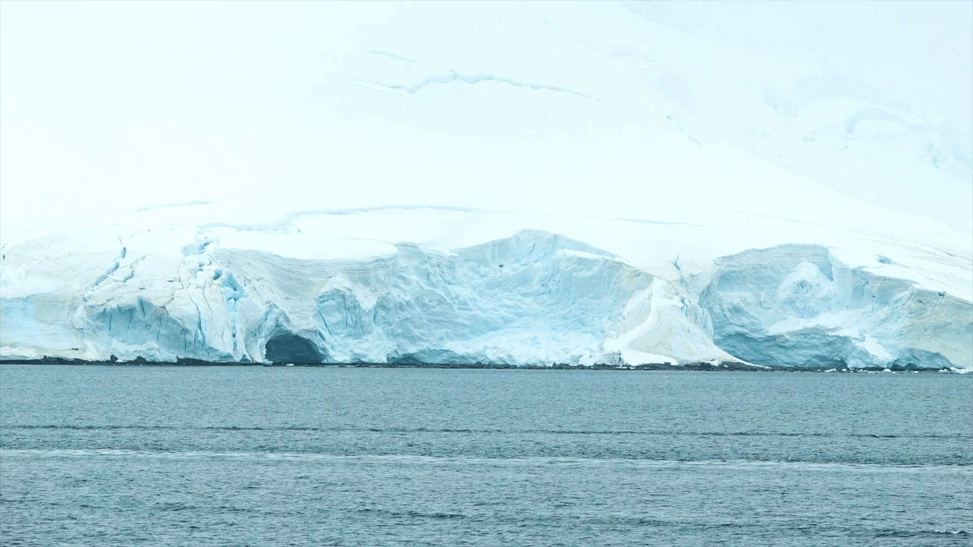 Ice Glaciers in Paradise Bay Antarctica Seen from a Moving Ship in